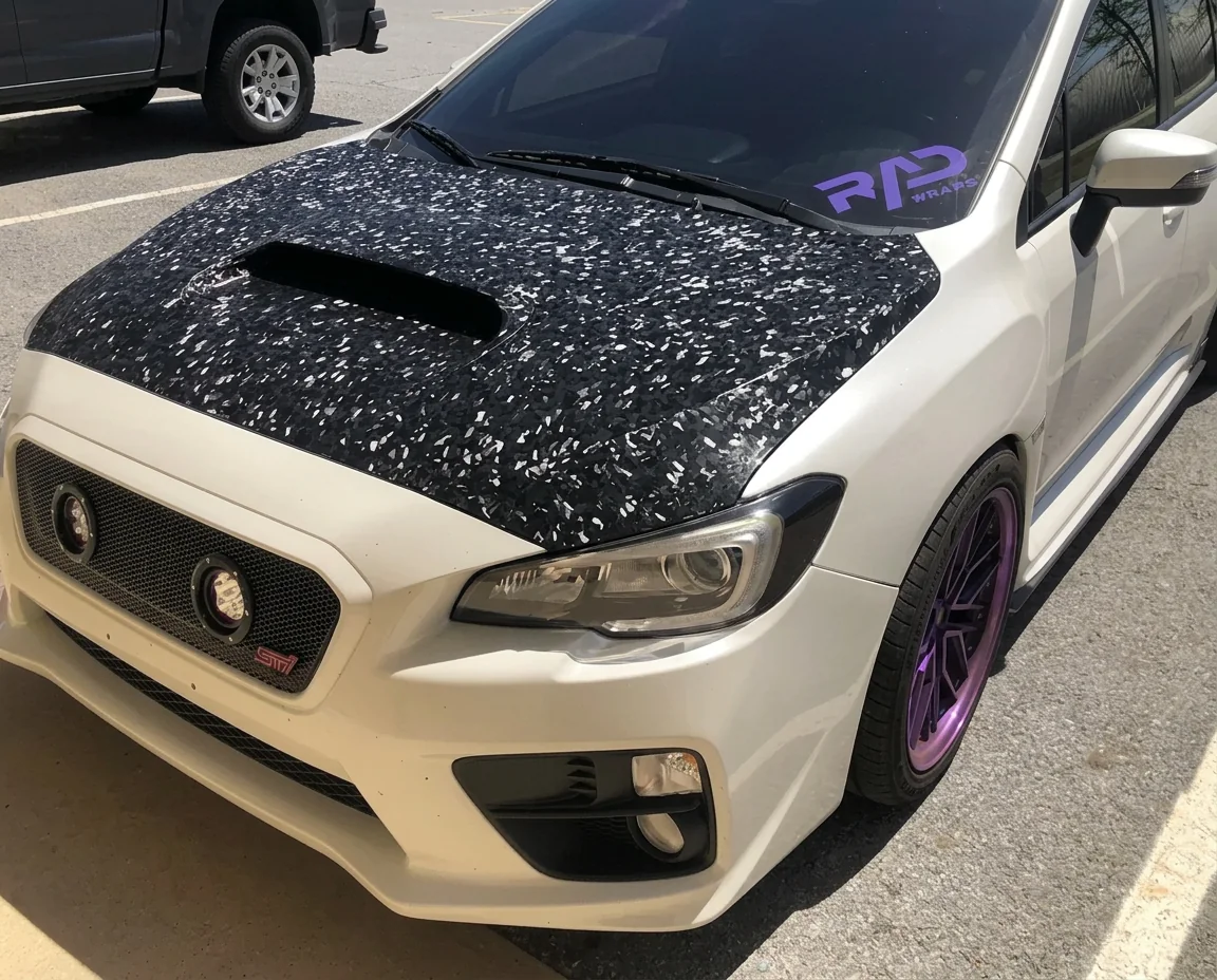 Black and white splatter hood wrap with chrome delete on a Subaru WRX